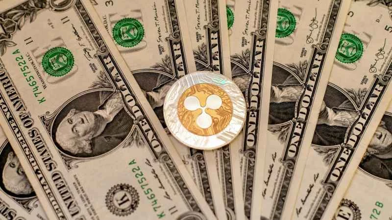 リップル社のRLUSDがアブダビで規制当局の承認を取得し、世界展開を加速